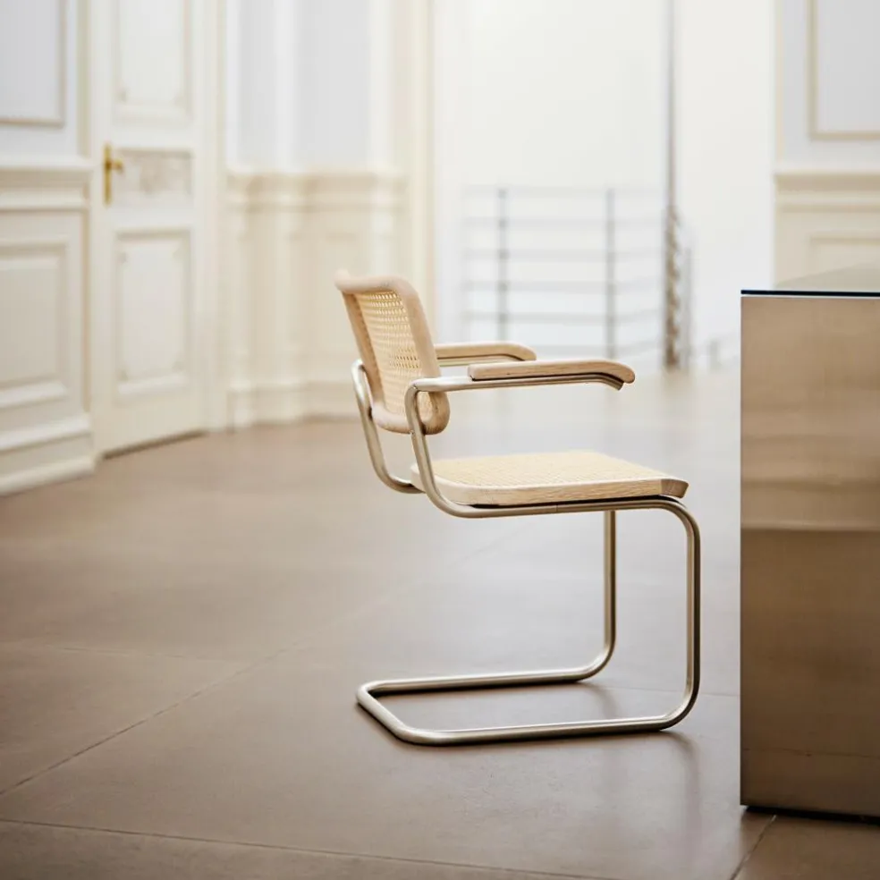 JS. THONET a personal Interpretation by Jil Sander S 64 V Nordic Freischwinger Armlehnstuhl mit Rohrgeflecht