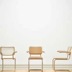 JS. THONET a personal Interpretation by Jil Sander S 64 V Nordic Freischwinger Armlehnstuhl mit Rohrgeflecht