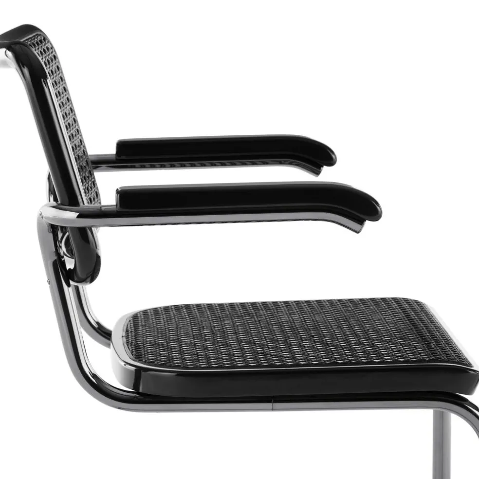 JS. THONET a personal Interpretation by Jil Sander S 64 V Serious Freischwinger Armlehnstuhl mit Rohrgeflecht