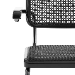 JS. THONET a personal Interpretation by Jil Sander S 64 V Serious Freischwinger Armlehnstuhl mit Rohrgeflecht