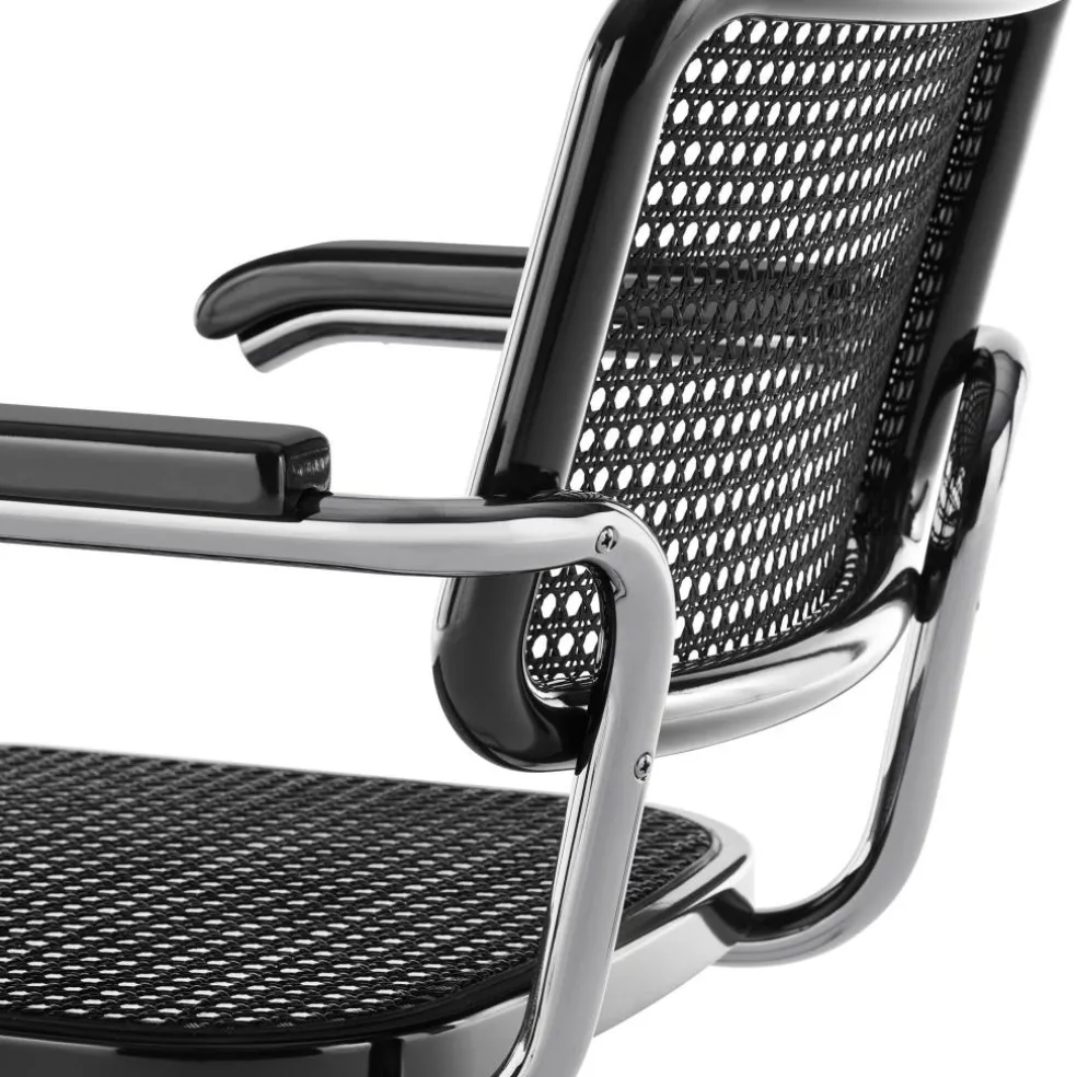 JS. THONET a personal Interpretation by Jil Sander S 64 V Serious Freischwinger Armlehnstuhl mit Rohrgeflecht